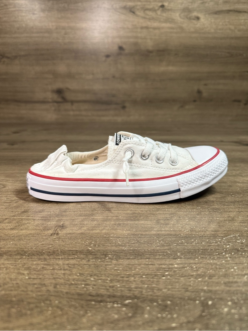 Converse Kids Low-Top Slip-On Canvas Sneakers in White with Red and Navy Trim